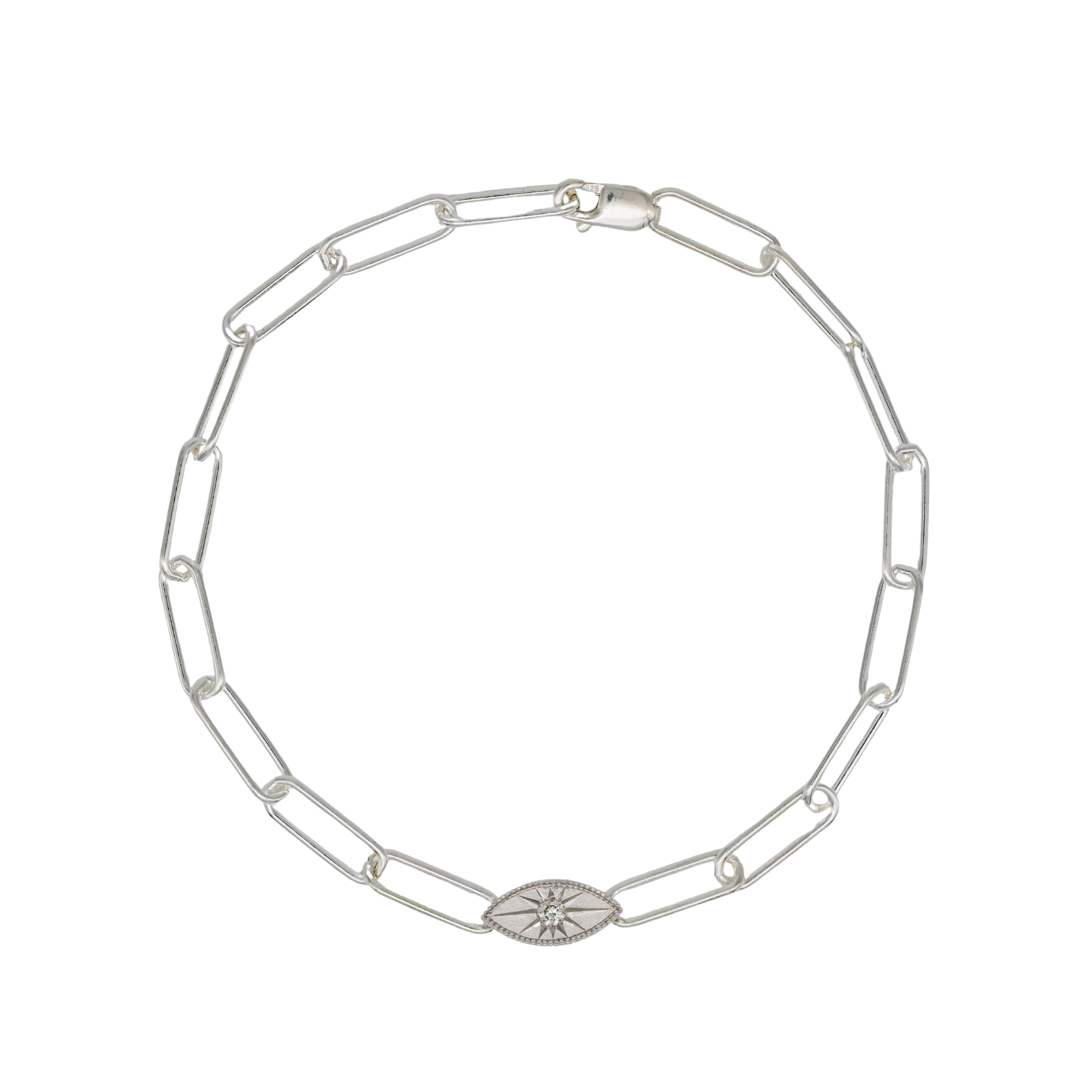 Grande Mati Bracelet (G) by Fiat Lux features elongated links and an oval Third Eye charm with a starburst design.