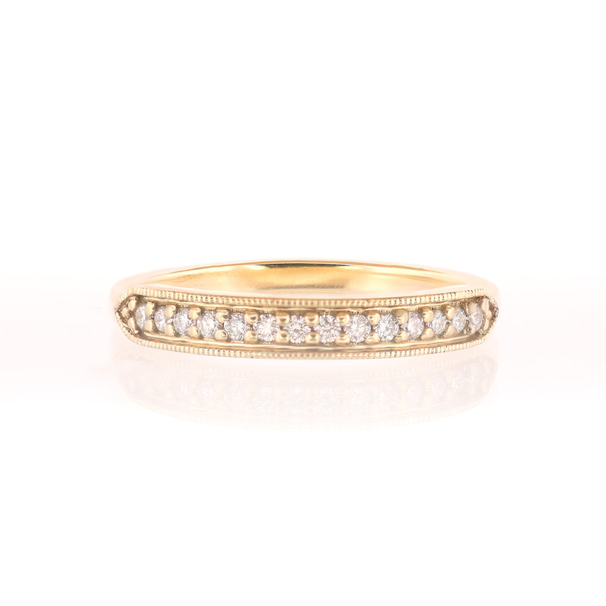 Fiat Lux Tuile Pavé Ring in 18K gold with a row of small, round diamonds, shown on a white background.