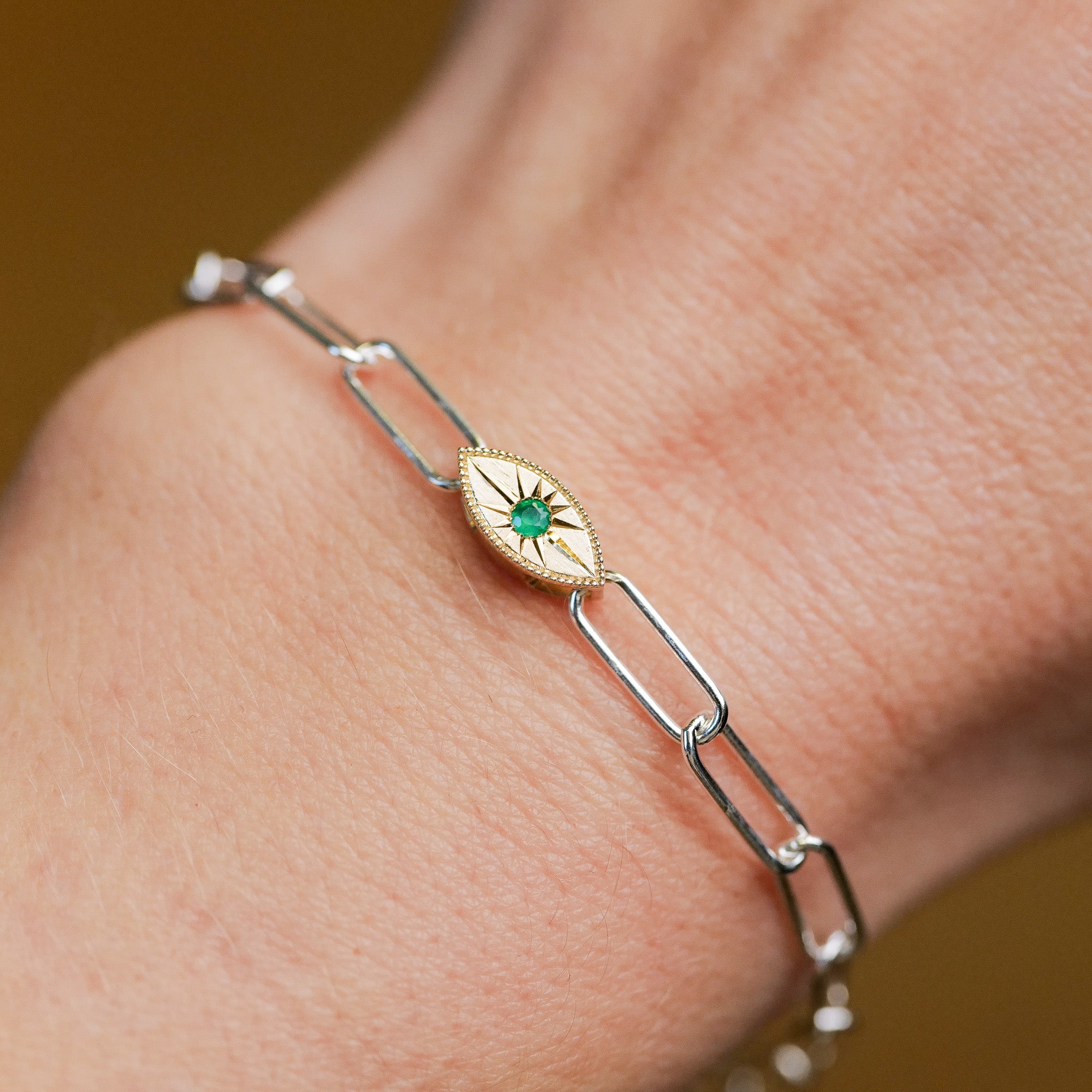 Fiat Lux Grande Mati Bracelet (G): Silver chain with 14K gold marquise charm and green gemstone, ideal for minimalists.