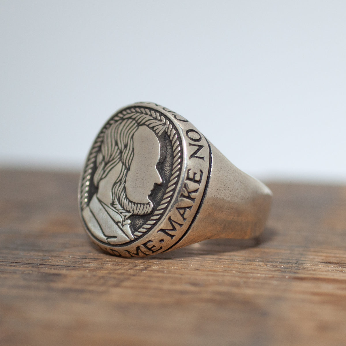Digby & Iona’s Honest Abe Signet Ring: sterling silver with Lincoln’s profile, styled like a vintage wax seal.