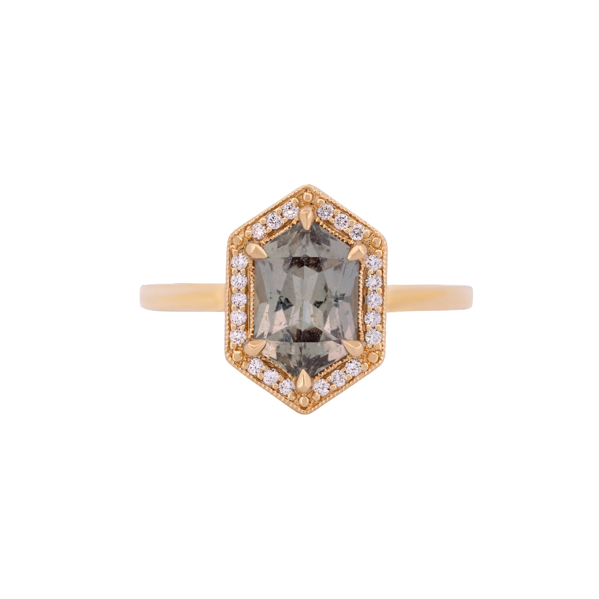 Fiat Lux Grande Hex Hester Tanzanian sapphire ring in an 18K gold setting with a diamond halo.