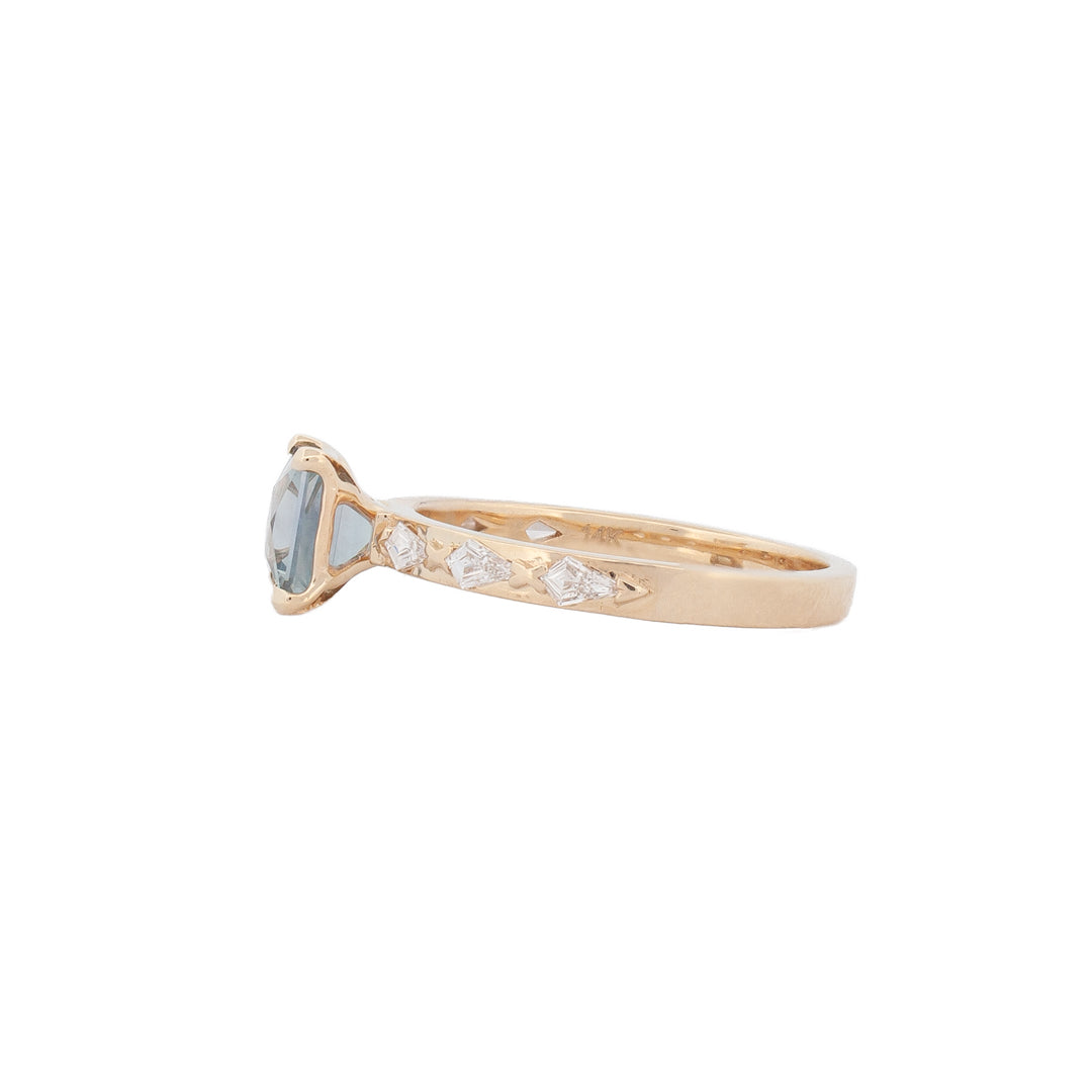 Fiat Lux Classic Theia Ring showcases a 1.41ct aqua sapphire and kite cut diamonds set in gleaming 14K gold.