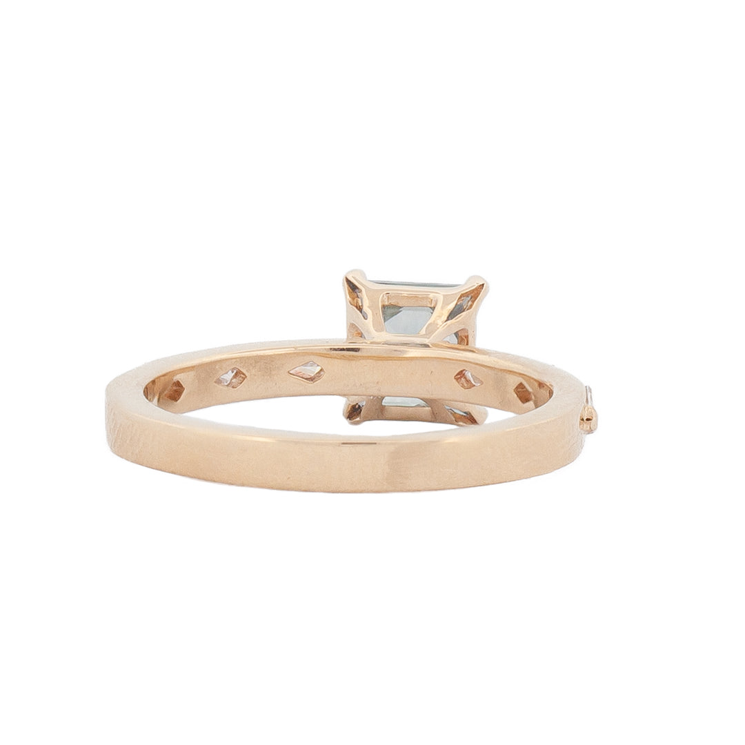 Fiat Lux Classic Theia Ring with 1.41ct aqua sapphire in prong setting, shown from the side against a white background.