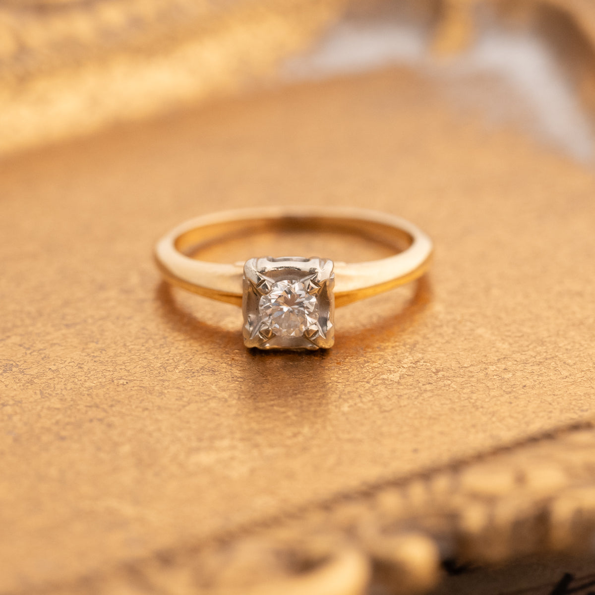 Vintage Two Tone Diamond Ring with a modern solitaire diamond, silver-toned setting, and 14k gold band.