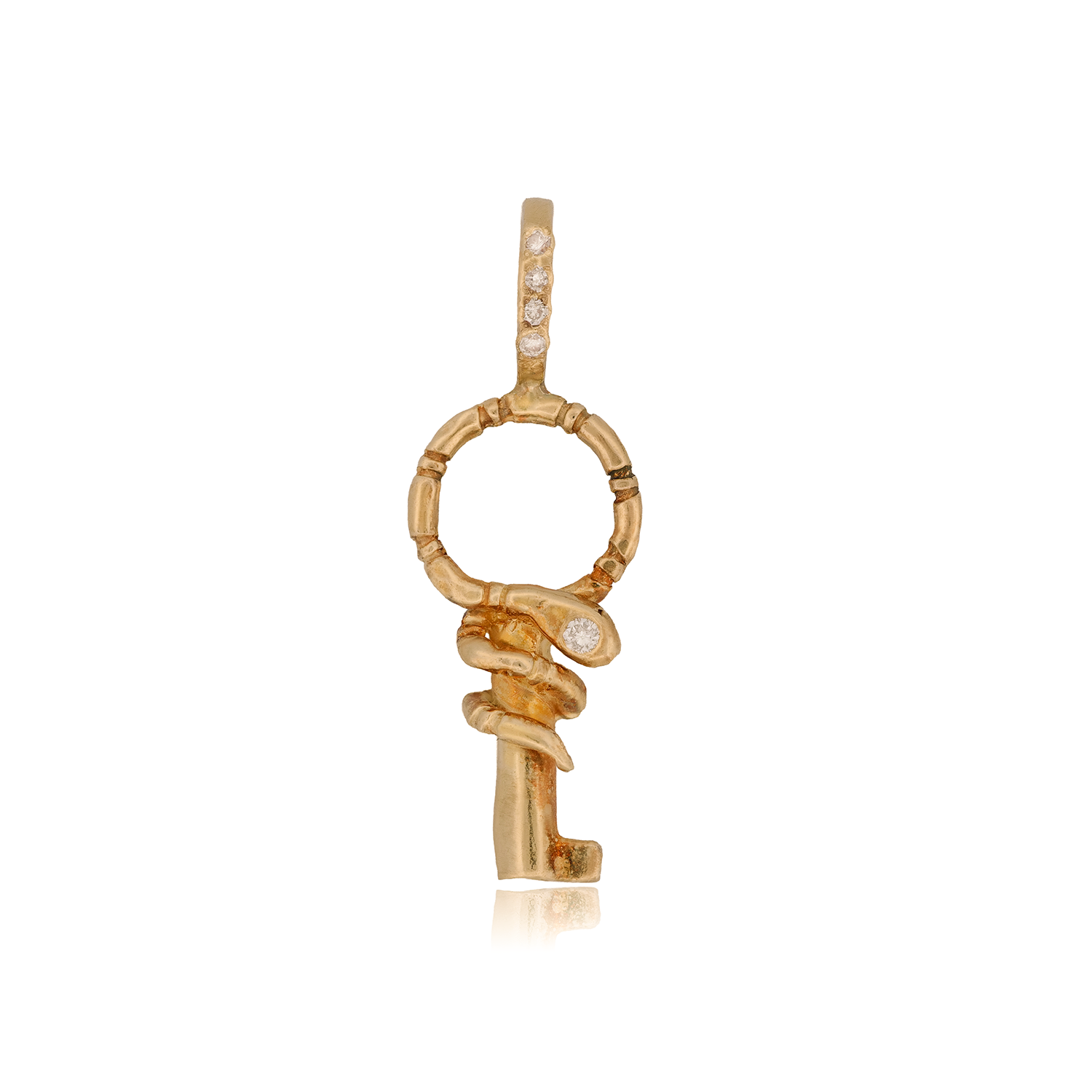 Acanthus Serpent Key Charm in 14K gold with textured design and diamond accents on a white background.