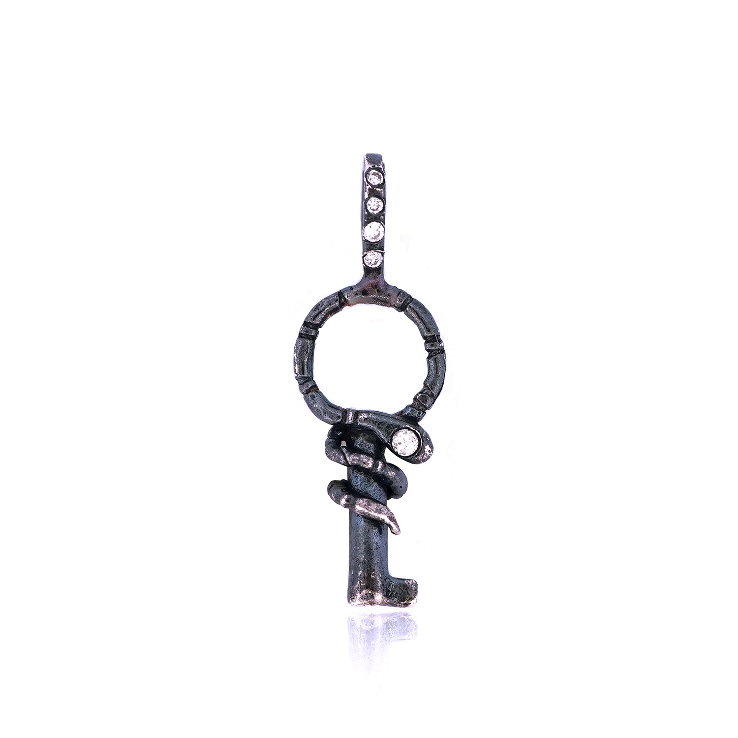 Acanthus Serpent Key Charm in 14K gold with a snake motif and diamond accents on an antique-inspired key.