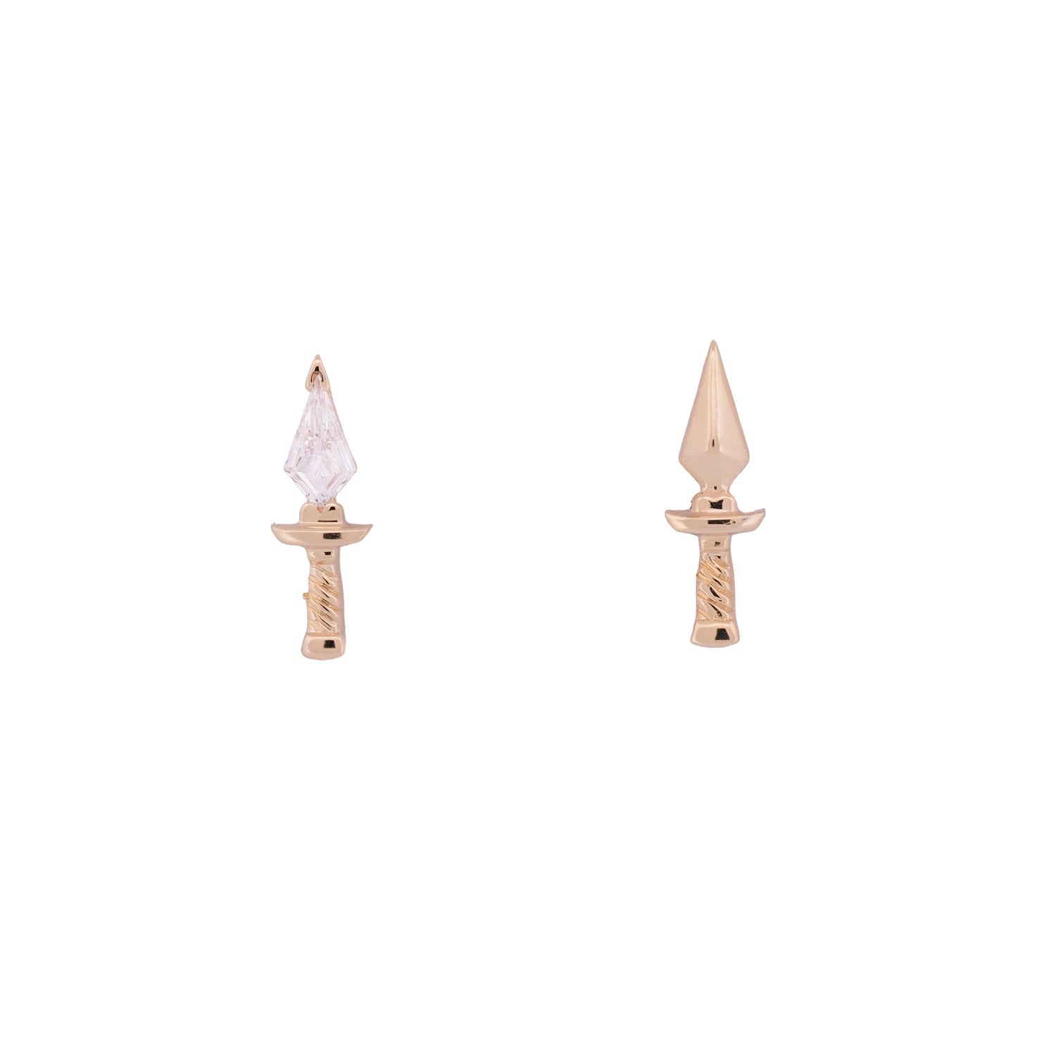 Fiat Lux Kite Dagger Stud: two small 14K gold sword earrings, one with diamond flatback, on white background.