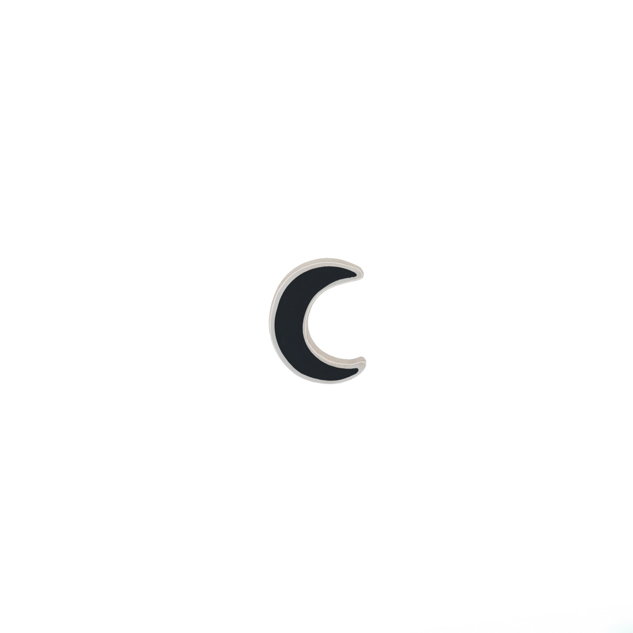 Fiat Lux small crescent moon-shaped charm with a black ceramic face and a white gold outline, centered on a plain white background.