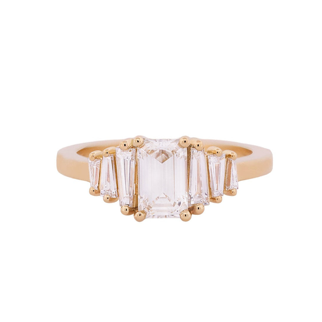 Fiat Lux Classic Calypso ring: 1.02ct emerald cut diamond, tapered baguettes, set in 18K gold.