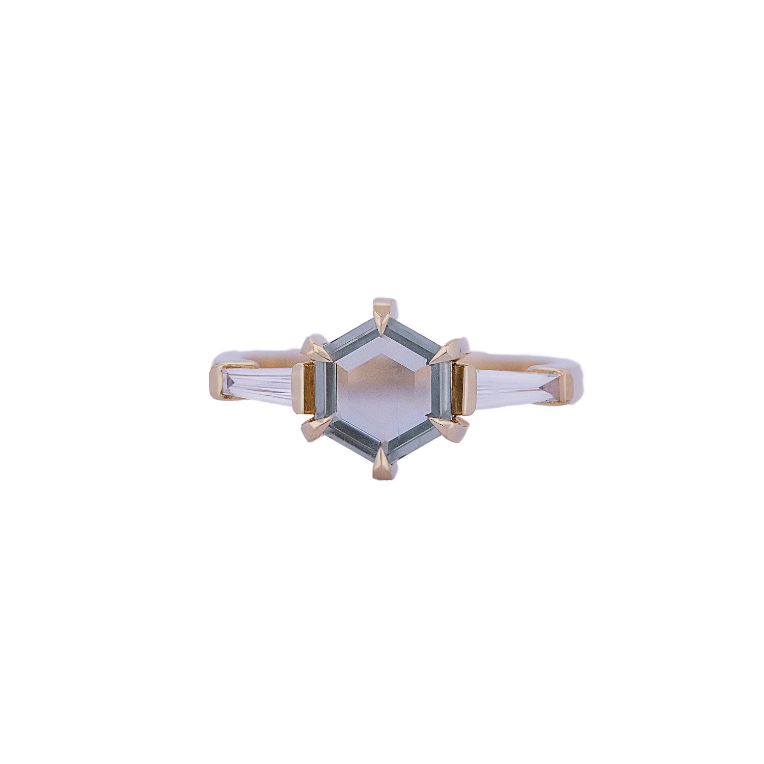 Fiat Lux Grande Calliope ring with a 1.50ct seafoam green hexagon sapphire and tapered baguette diamonds.