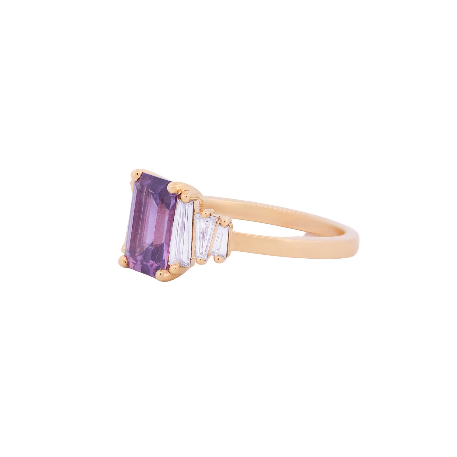 Fiat Lux Grande Calypso ring: 18K gold, 1.94ct mulberry pink sapphire, diamond baguettes, white background.