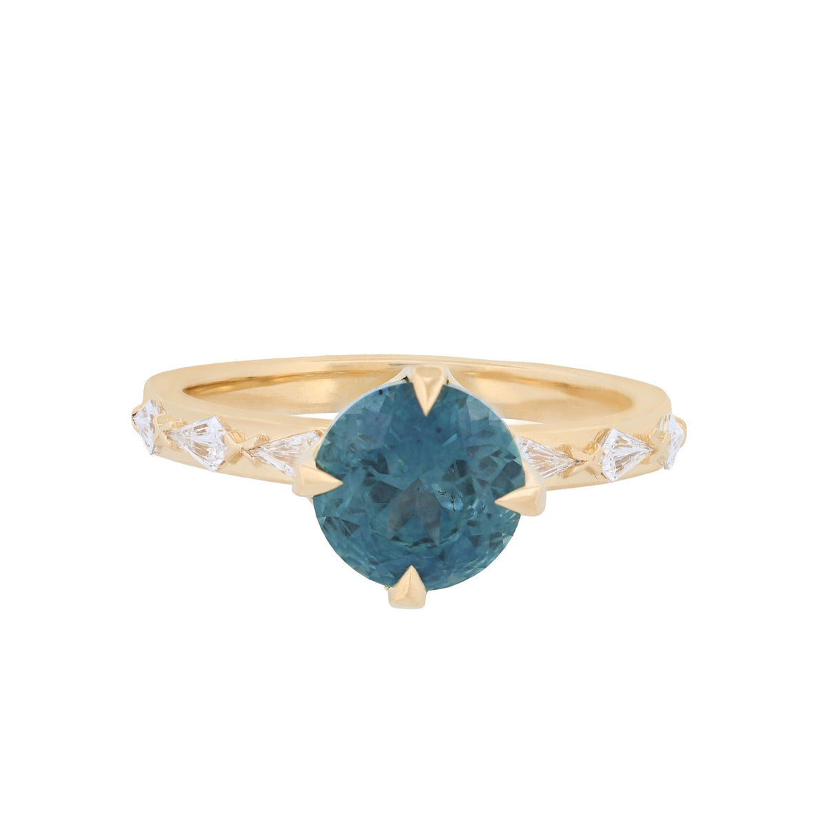 The Grande Theia Ring by Fiat Lux features a 2.52ct Twilight Blue Sapphire and white diamonds on a 14K gold band.