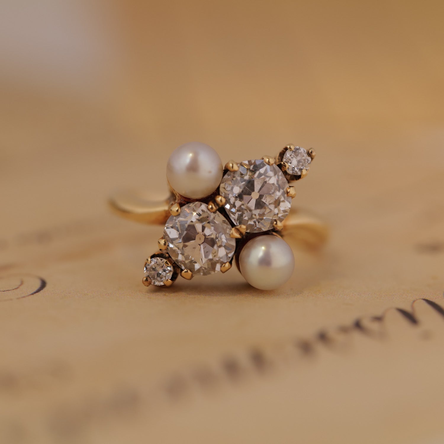 Vintage Double Pearl Diamond Ring by Vintage—timeless elegance with antique cultured pearls and three diamonds.