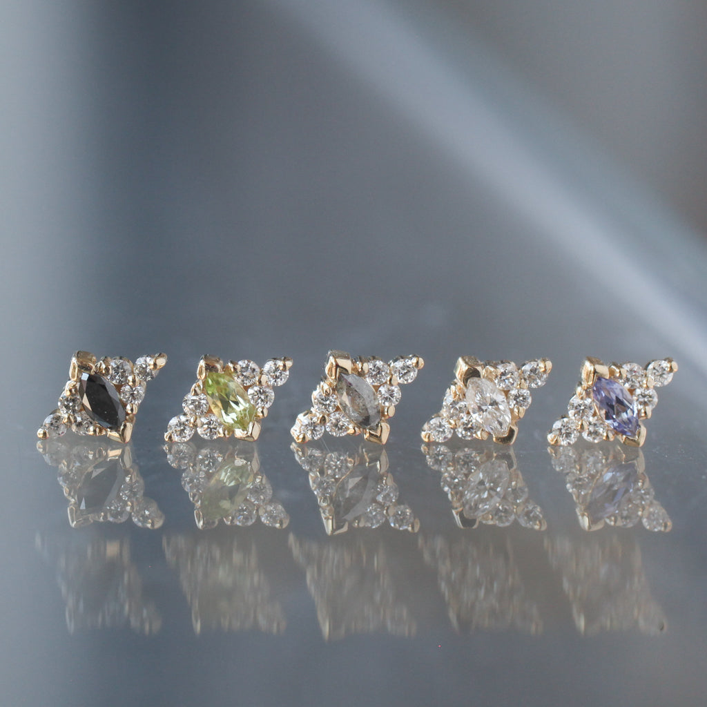 Five yellow gold Embrace Marquise flatback stud earrings, each with a marquise-cut center stone and round accents.