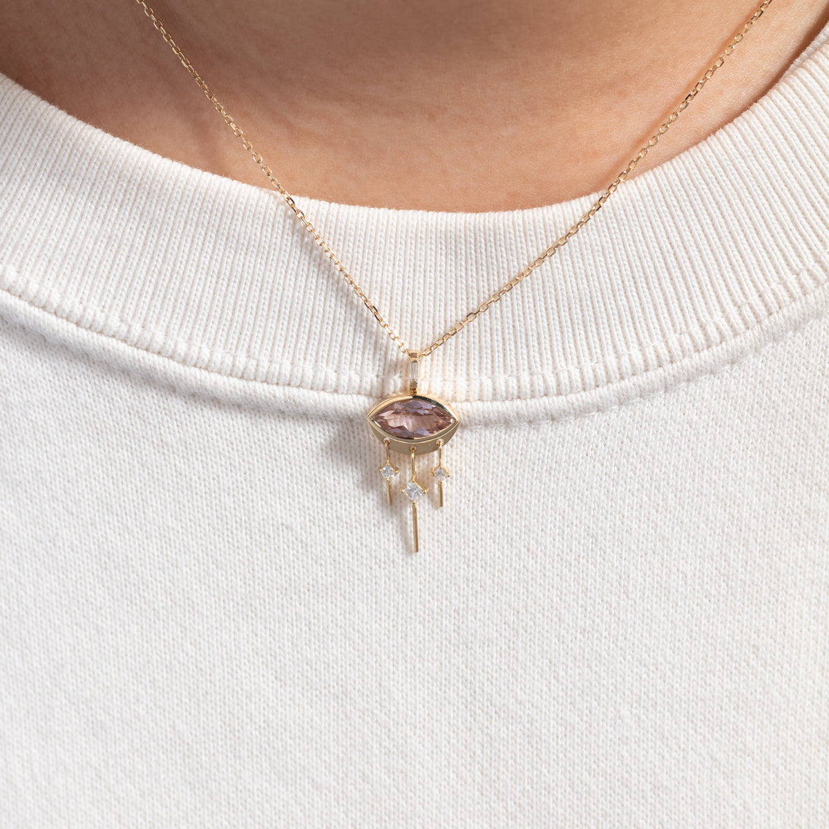 Celine Daoust Marquise Eye with Diamond Dangles: a 14k gold necklace with a marquise-shaped tanzanite and diamond dangles.