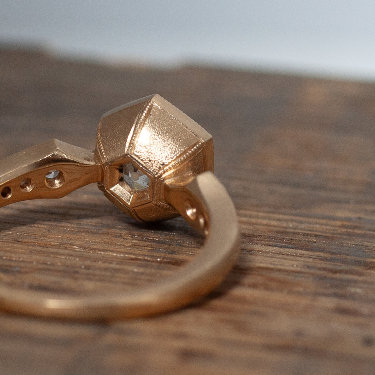 DMD Metal Hex Bezel Ring: 1.22ct antique Old European Cut diamond set in 14K gold with faceted hex bezel.