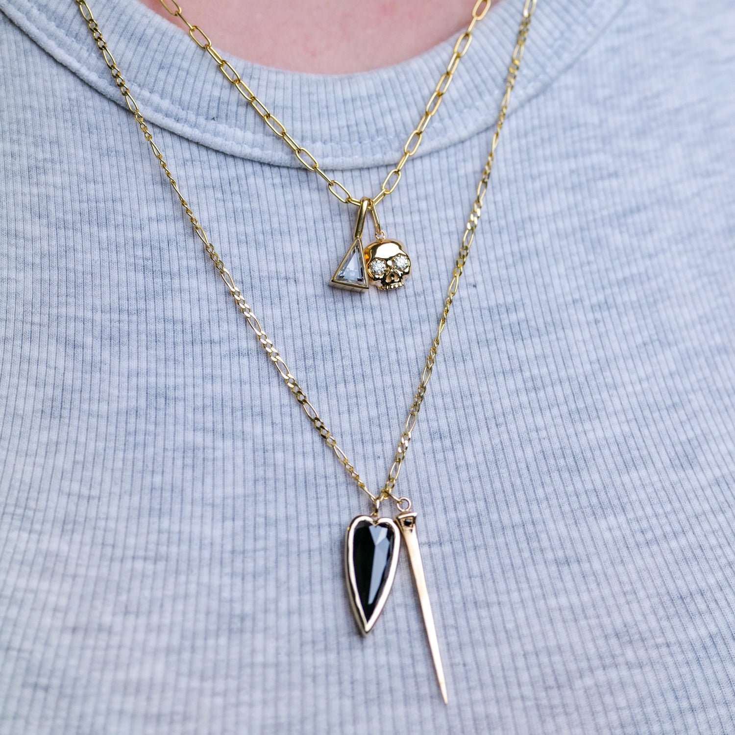 Fiat Lux Grande Punk Heart Charm: 14K gold layered necklace with black heart and gold spike pendants.