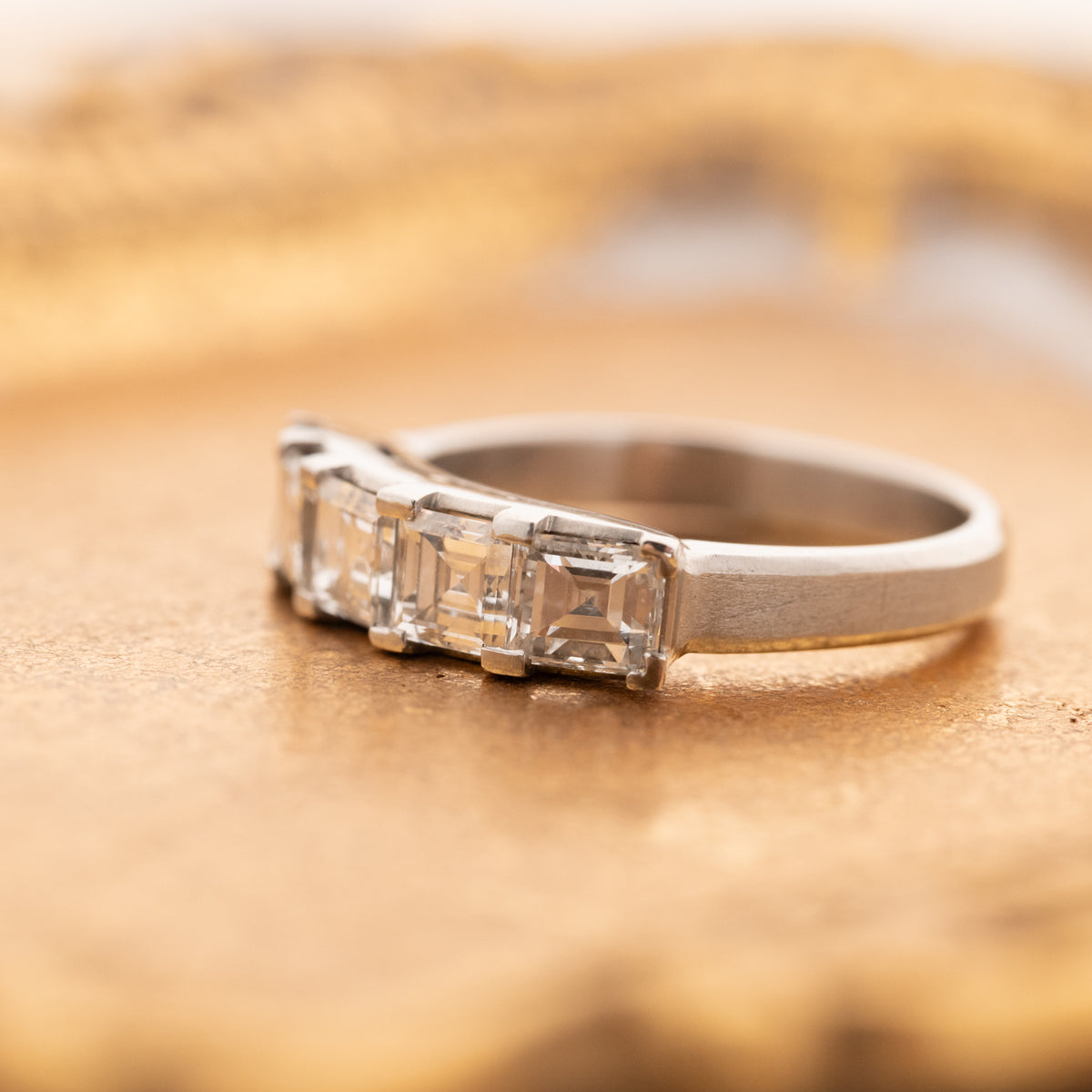 Vintage Carré Cut Diamond Band (2.04ct) - 5mm featuring a platinum band set with four carré cut diamonds.