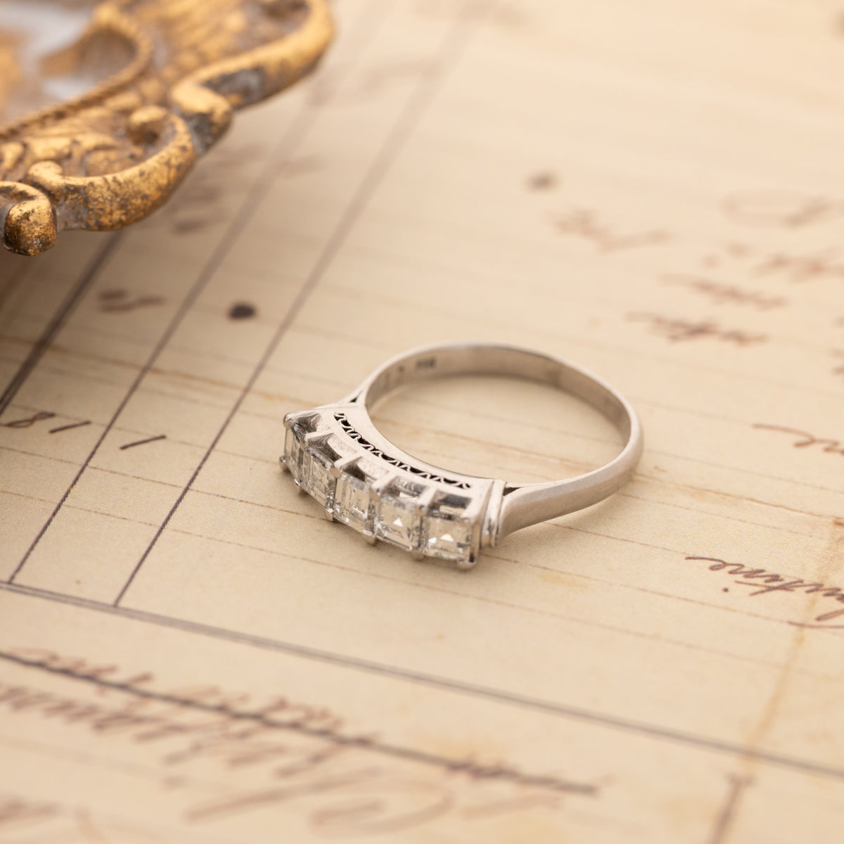 Vintage Carré Cut Diamond Band - 4.5mm platinum ring with four square-cut carre diamonds in a row.