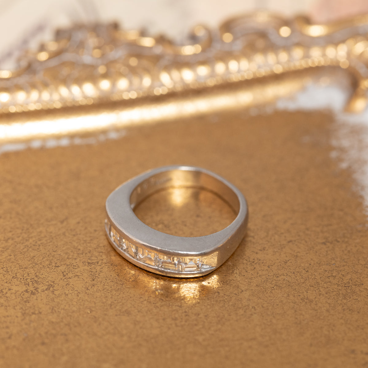 Vintage Platinum Channel Set Diamonds Ring