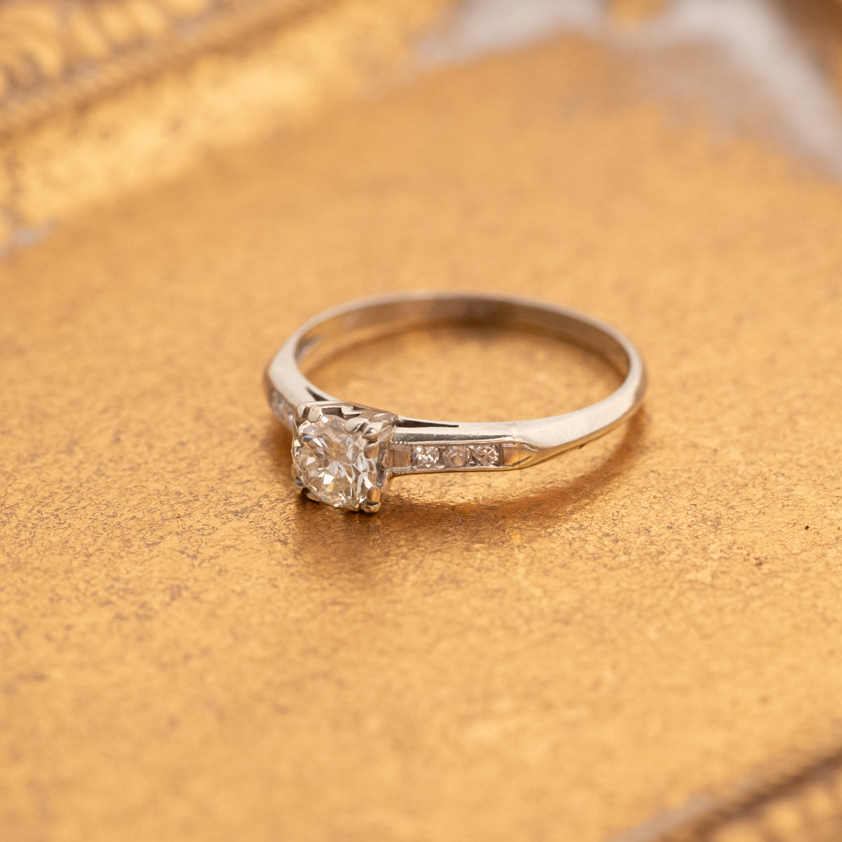Vintage Old European & Single Cut Diamonds Ring in 14k white gold with a prominent OEC diamond and accent stones.