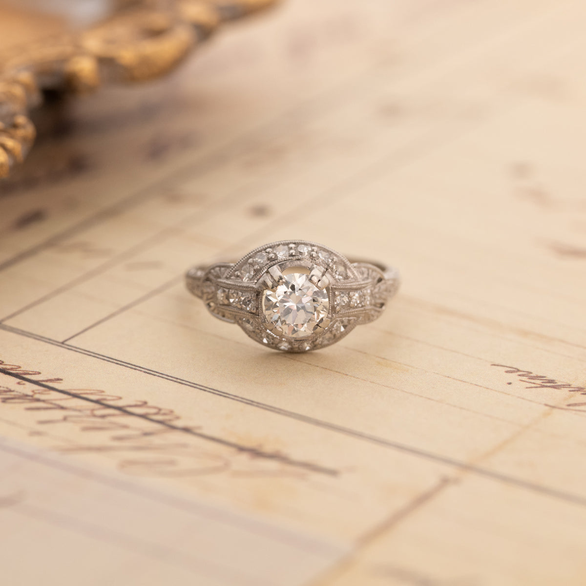 Vintage Transitional Cut Diamond Halo Ring