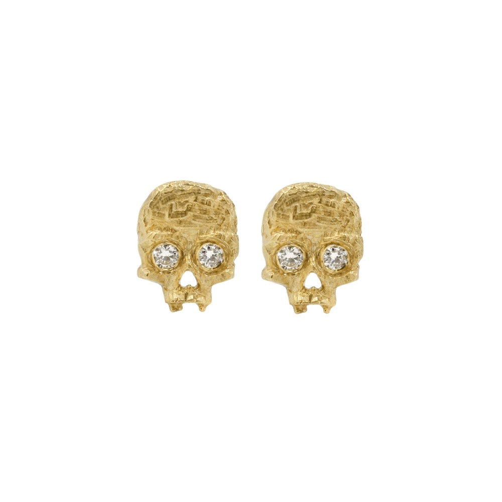 skullie studs with diamond eyes and cubist texture