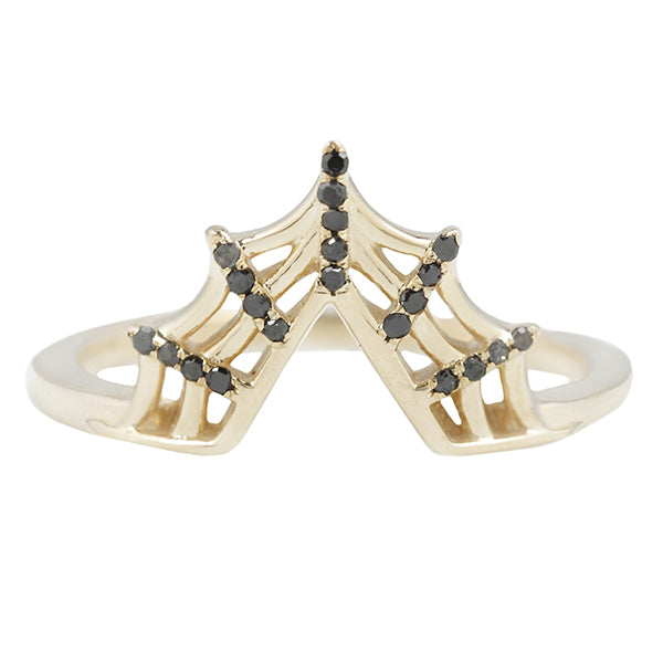 A web 10k studded with black diamonds to pair with a pear or a marquise. From Margaret Cross's Brooklyn Studios.
