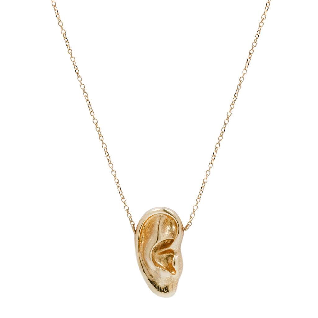 A solid 14k gold ear on a solid gold chain to remind you of the many ways that what is said means what it does